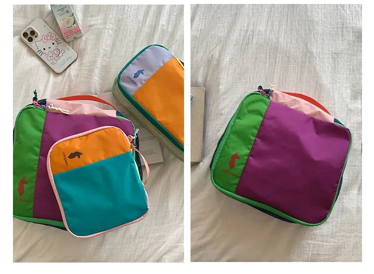 A set of colorful waterproof travel toiletry bags in green, purple, and orange nylon construction.
