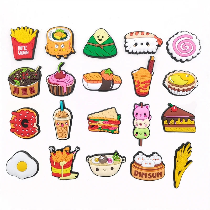 A collection of colorful decorative shoe charms and pins featuring various food items like sushi, ice cream, and fruit.