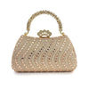 A beige crystal-embellished evening clutch bag with a gold chain strap.