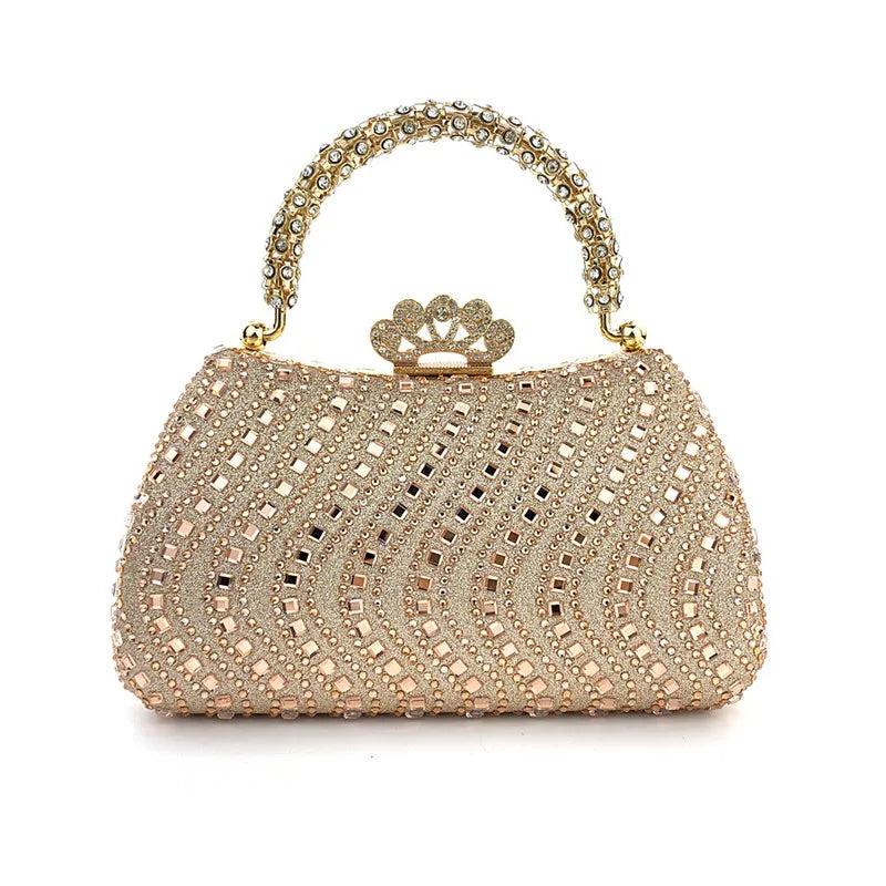 A beige crystal-embellished evening clutch bag with a gold chain strap.