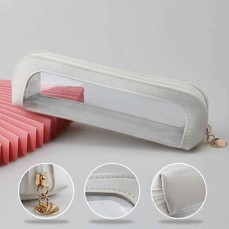 A clear, rectangular cosmetic organizer pouch with a white frame and gold hardware shown from multiple angles.