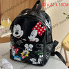 Mochila de peluche negra con dibujo de ratón y pato, personajes como Mickey y Minnie Mouse