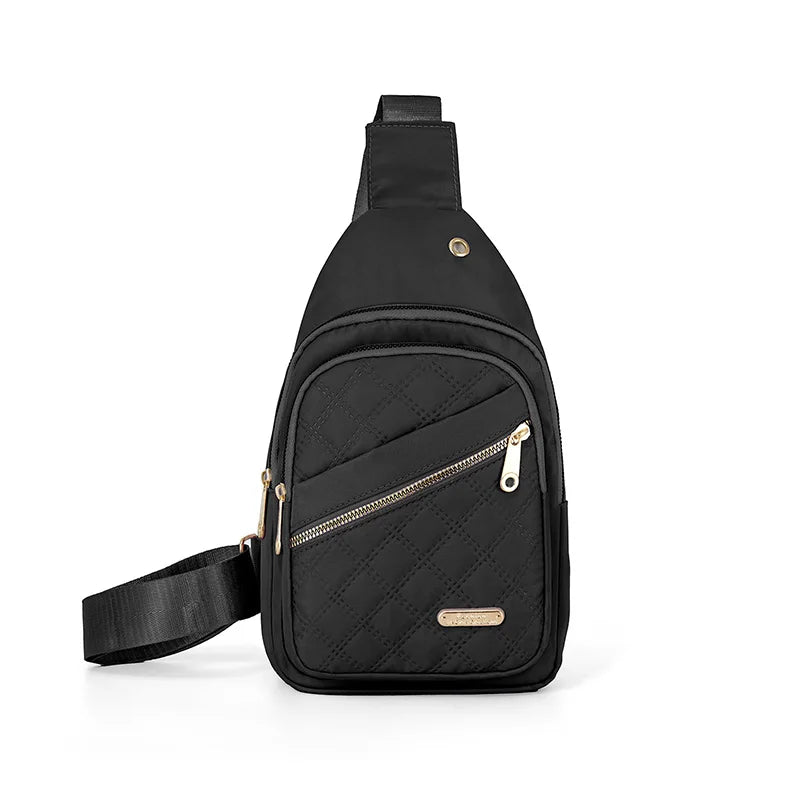 Sac bandoulière noir matelassé avec poche zippée et sangle réglable