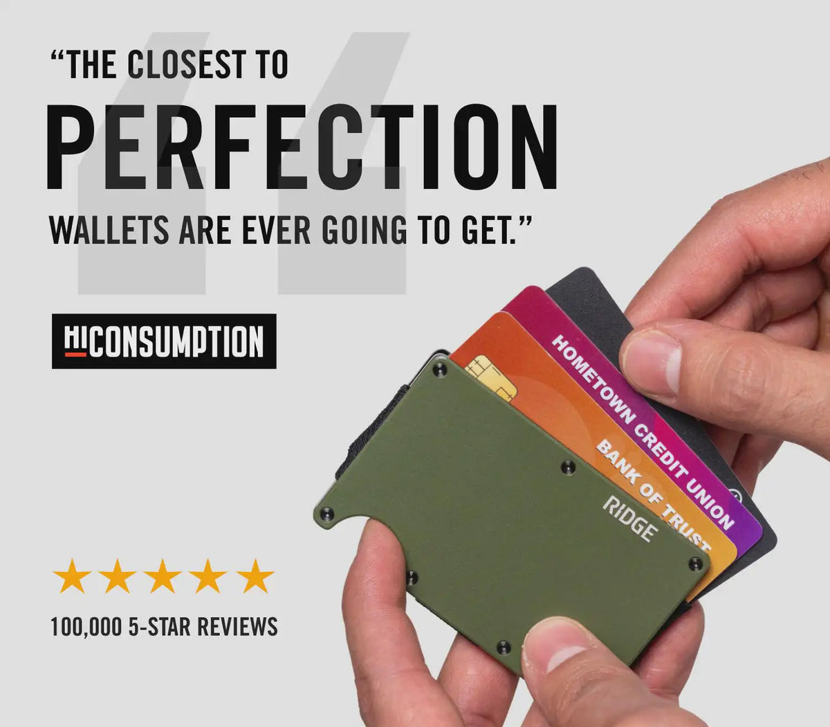 A hand holds a slim green RFID blocking wallet with various credit cards and a bank card inside.