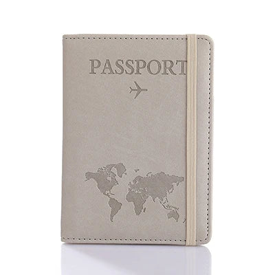 A light beige passport organizer wallet featuring a world map and an airplane icon.