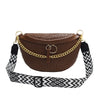 A brown woven pattern waist bag with gold chain detailing and black strap.
