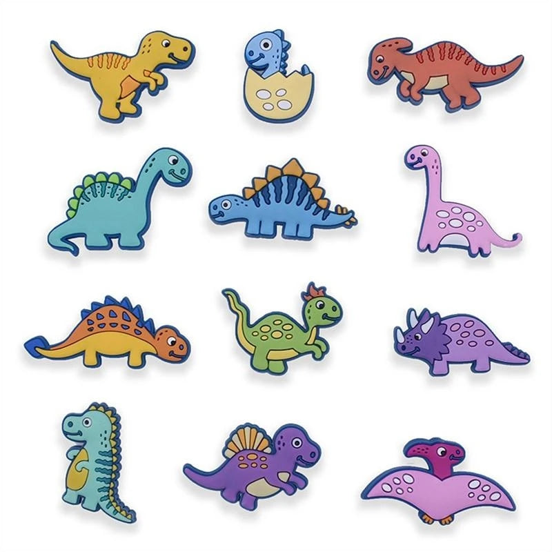 A collection of colorful dinosaur-themed shoe charms and pins for clogs and sandals.