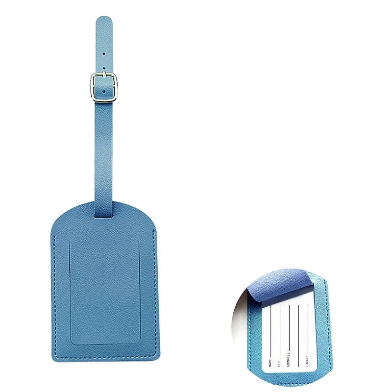 A light blue PU leather luggage tag with a silver clip and an ID card holder slot.
