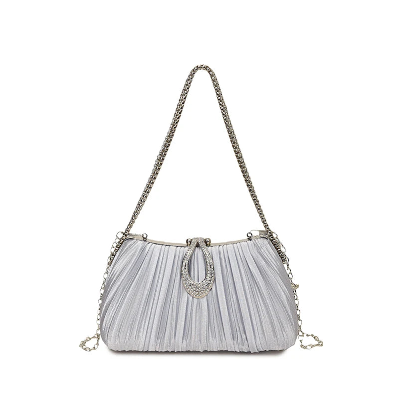 Silver rhinestone evening clutch bag with a long chain strap and pleated texture