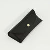 A black PU leather hard shell sunglasses case shown from above.