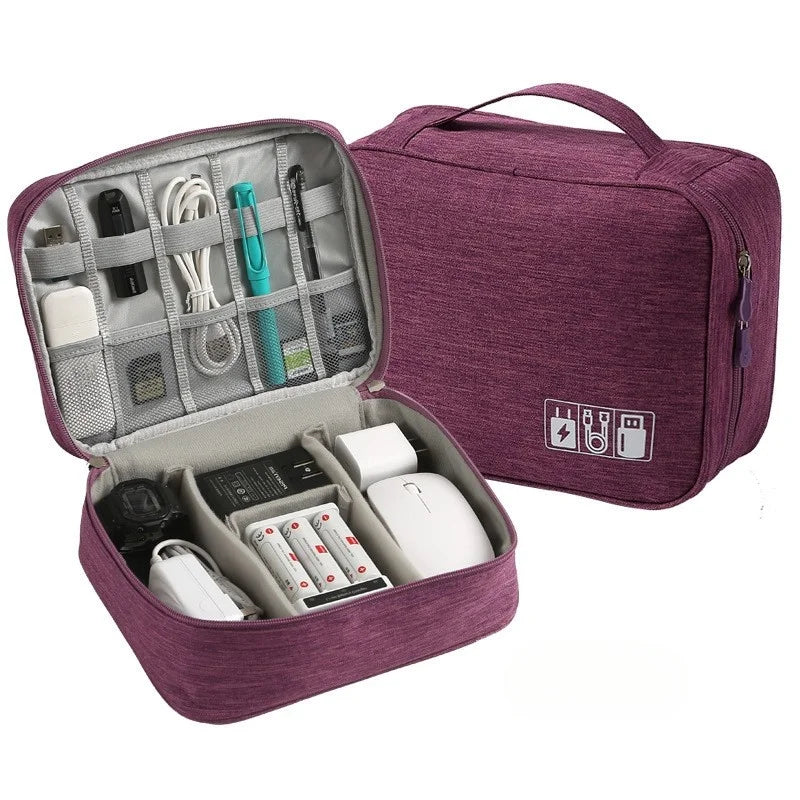 A purple leather cable storage organizer bag open to show various electronic cables and accessories.