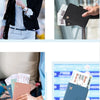 A hand holds a dark brown slim PU leather RFID blocking passport and ID wallet.