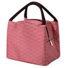 A red and white striped insulated lunch tote bag with a black adjustable shoulder strap.