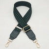A dark green braided nylon bag strap with gold-toned metal hooks.