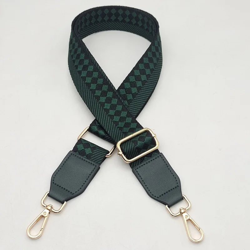 A dark green braided nylon bag strap with gold-toned metal hooks.