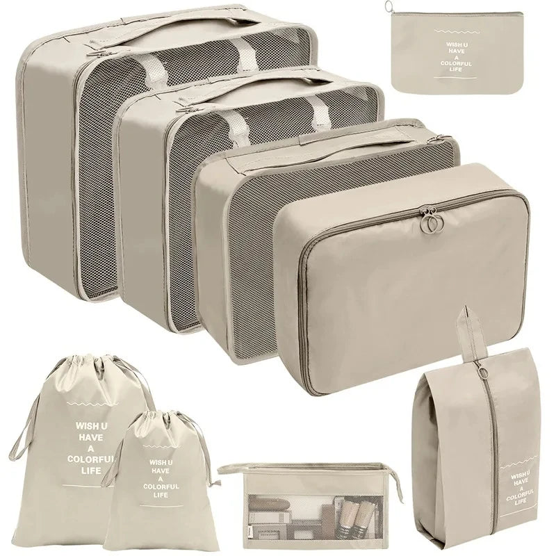 A set of beige fabric storage organizers and pouches for organizing various items.