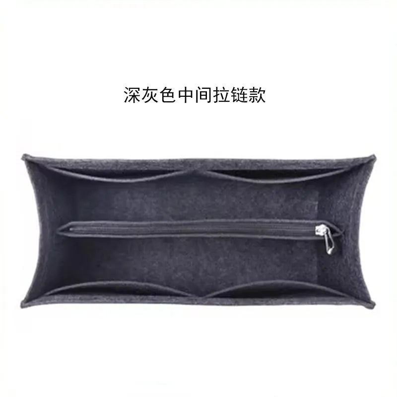 A dark gray felt bag organizer insert with a zipper closure.