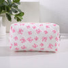 Bolsa acolchada blanca para maquillaje con estampado de lazo rosa