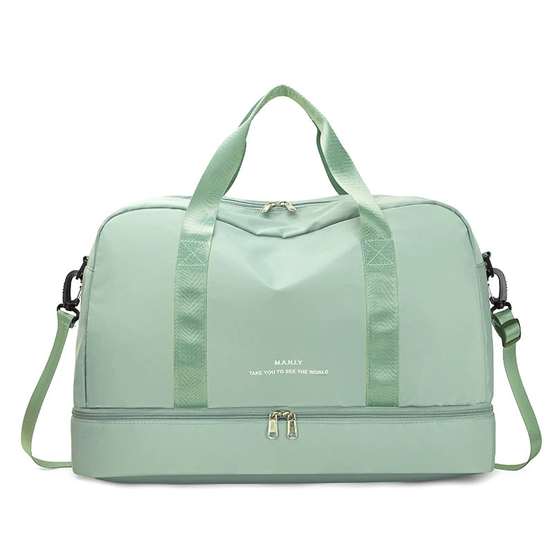 A light mint green expandable nylon travel duffle bag with padded straps and a zipper closure.