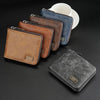 A collection of leather zipper wallets in brown, navy blue, and gray colors displayed on a dark surface.