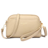 A beige PU leather trendy shoulder crossbody bag with gold hardware.