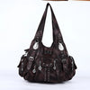 A dark brown vintage PU leather hobo shoulder bag with silver hardware.