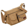A tan canvas tool bag featuring multiple zippered and flap pockets for storage.