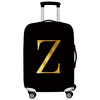 Black rolling suitcase with a gold letter Z printed on it.