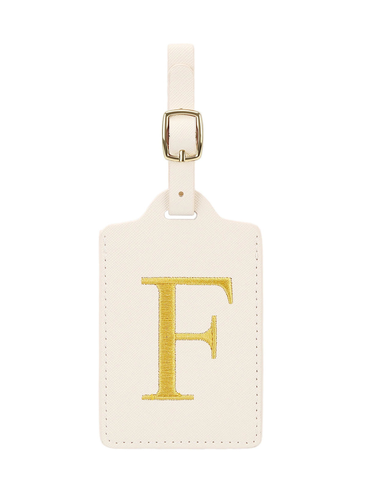 Étiquette de bagage en cuir crème rectangulaire avec une lettre F brodée en or et un clip métallique argenté.