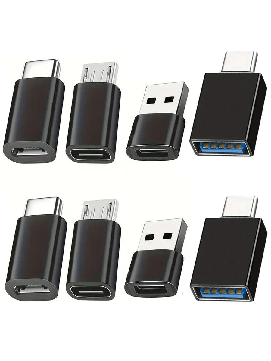 A set of black universal USB to USB-C adapter converters shown in various orientations.