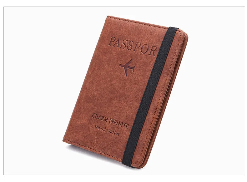 A brown leather passport holder with a black trim and embossed text on the cover.