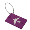 A purple aluminum luggage tag with a white airplane silhouette and a silver cord.