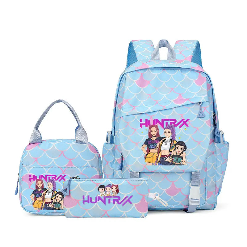 A light blue and pink multi-compartment casual backpack featuring characters from the Huntrix franchise.