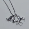 Silver necklace with a cowboy boot, hat, and horse keychain set