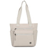 A beige canvas tote bag with two zippered pockets and light beige straps.