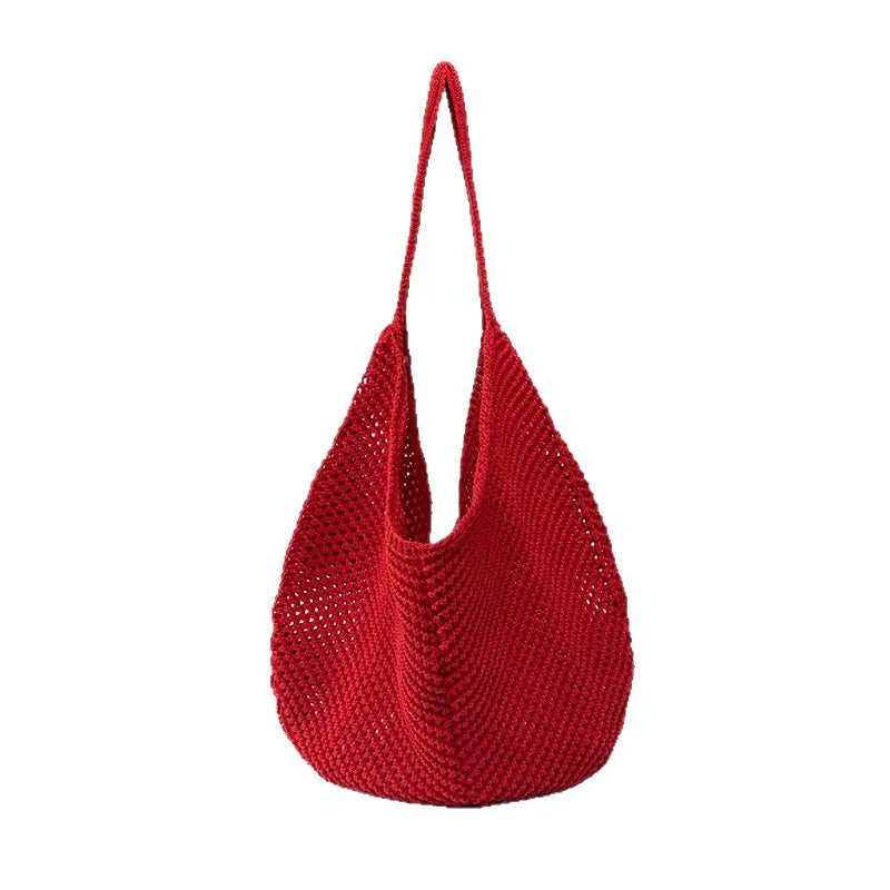 A bright red crochet shoulder bag featuring a mesh detailing.
