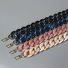 A collection of acrylic resin detachable bag chain straps in various shades of blue, purple, and pink laid out diagonally.