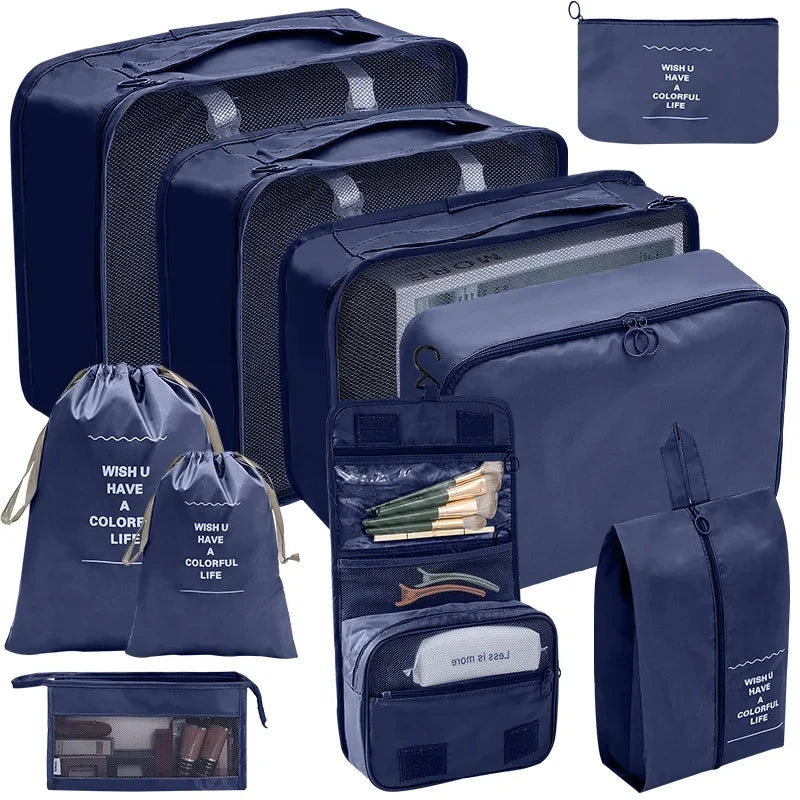A set of dark blue fabric storage organizers including various sized pouches and a zippered case.