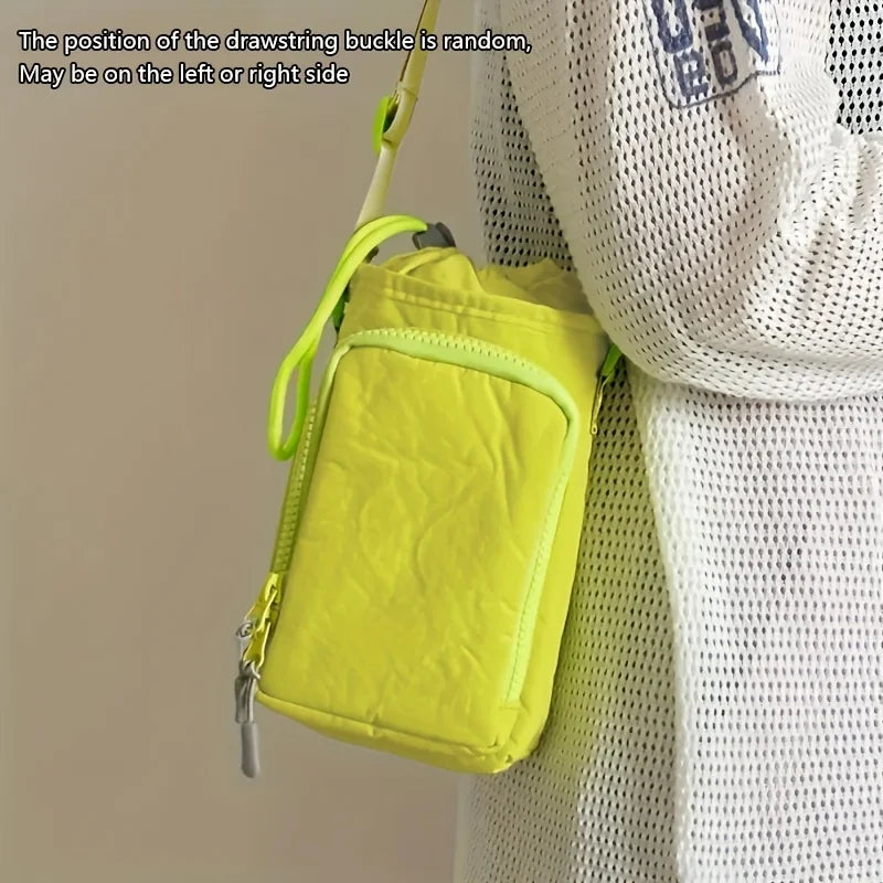 A bright lime green adjustable water bottle carrier bag with a zipper is shown against a white knitted garment.