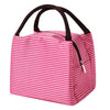 Pink and white striped insulated lunch tote bag with a black adjustable shoulder strap