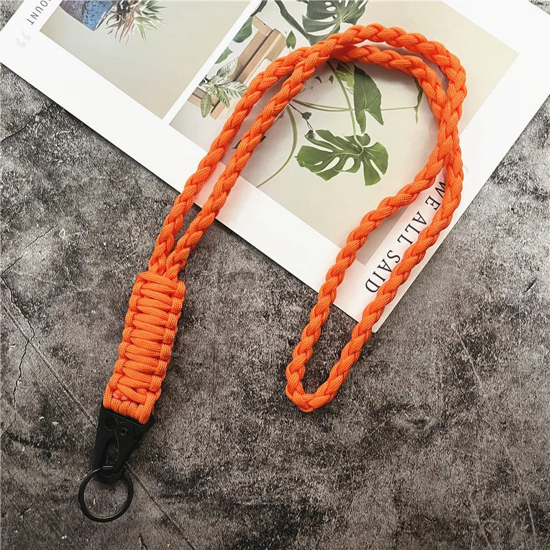 Orange hand-woven nylon lanyard with a metal hook displayed on a white background.