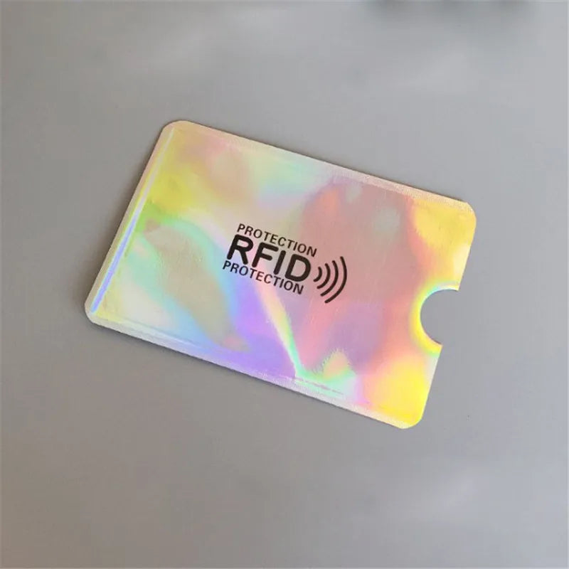 A translucent, iridescent RFID protection card holder is shown against a light gray background.