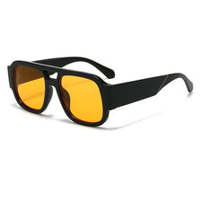 Black oversized square sunglasses with bright orange lenses and black arms.