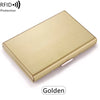 A golden stainless steel card holder with an RFID protection feature.
