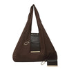 A dark brown cloth storage pouch with a black leather accent and gold hardware.