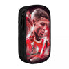 A black pencil case featuring a graphic design of a soccer player's face in red and white.