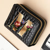 A black PU leather double-zip clutch wallet with a gold accent and a cartoon print design.