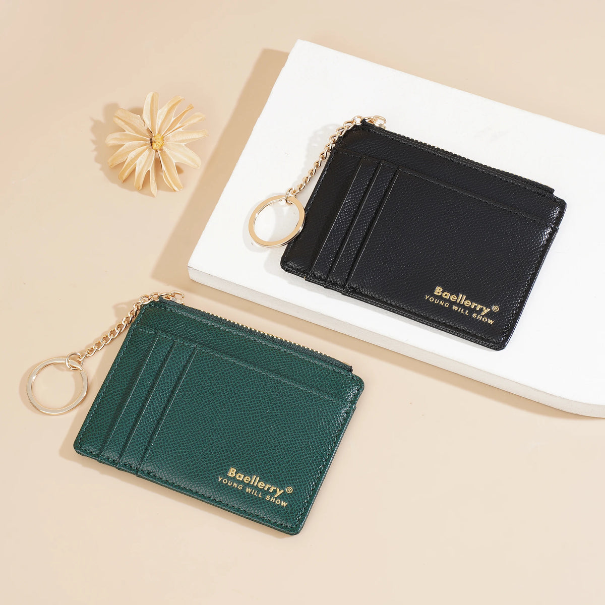 A dark green leather card holder wallet with a gold chain is displayed on a white background.
