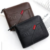 A dark brown leather wallet and a black leather wallet are shown next to some paper.