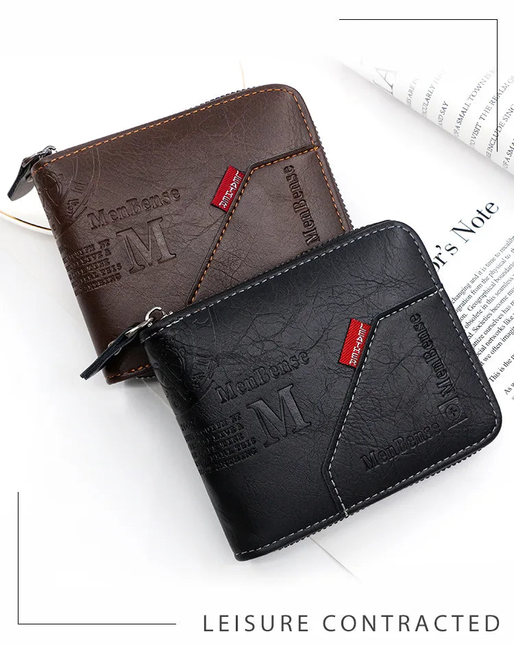 A dark brown leather wallet and a black leather wallet are shown next to some paper.